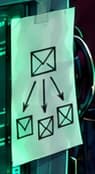 Envelope-and-arrows sketch fixed to the left CRT