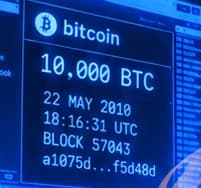 Bitcoin transaction details on the blue monitor