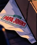 Papa John’s napkin beside the lower-left pizza box