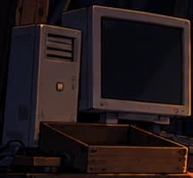 Unconnected computer with an empty wooden tray