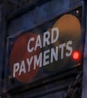 Muted overlapping red and orange circles behind Card Payments