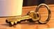 Small brass key beside the coffee cup