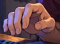 Hand paused above the keyboard