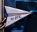 White paper plane beside the door chains