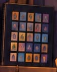 Small framed grid of colourful catalogue images