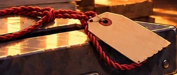 Red evidence cord and blank tag around a locked box