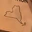 Small New York state outline drawn on the application folder