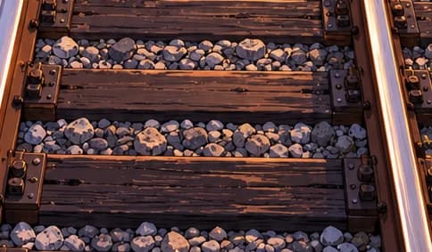One incoming track on shared sleepers represents the common history before the fork