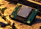 Generic detached circuit board beside the laptop, a symbolic reference to removal of wireless radios