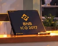 THE BNB FOLDER. BNB / ICO 2017 connects the new exchange to the preceding token sale. The folder is an illustrative prop, not an authenticated company document.
