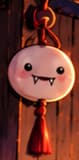 THE SMILING FANG. The friendly fang charm names the vampire strategy in miniature. Its smile reinforces the chef's invitation and the providers' voluntary participation in the liquidity migration.