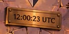 12:00:23 UTC. The plaque above the door records the precise genesis time on 1 December 2020. The seconds distinguish it from the earlier noon minimum-time setting.