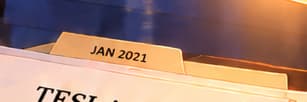 THE JANUARY TAB. JAN 2021 marks the investment-policy change. It does not establish a purchase day. The tab sits above the report, separating that timing from the February receipt.