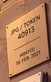 THE TOKEN AND MINT DATE. JPG / TOKEN 40913 and MINTED 16 FEB 2021 come from the lot record. The plaque separates the digital object's identifier and mint date from the later sale.