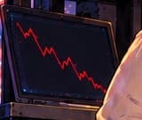 THE RED CHART. On the left, a laptop remains open behind the counter. Its descending red line brings the market's bad news into the warm restaurant interior.