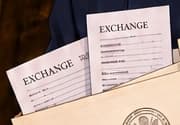 Exchange slips. These symbolic slips reference Ripple's programmatic sales on exchanges, whose circumstances produced a different result from institutional sales.
