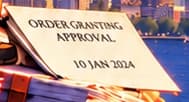 The approval at his feet. 10 JAN 2024 points to the single order approving eleven exchange proposals. The paper represents market access, not regulatory endorsement of Bitcoin.