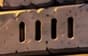 Four tallies. Four engraved strokes above the plaque answer the single stroke on card 015 and mark the fourth milestone.