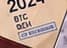 Two assets and a route. Tiny asset markings and a boxed routing stamp on the envelope refer to Bitcoin, Bitcoin Cash and repayment through designated exchanges. These miniature clues need the enlarged artwork.